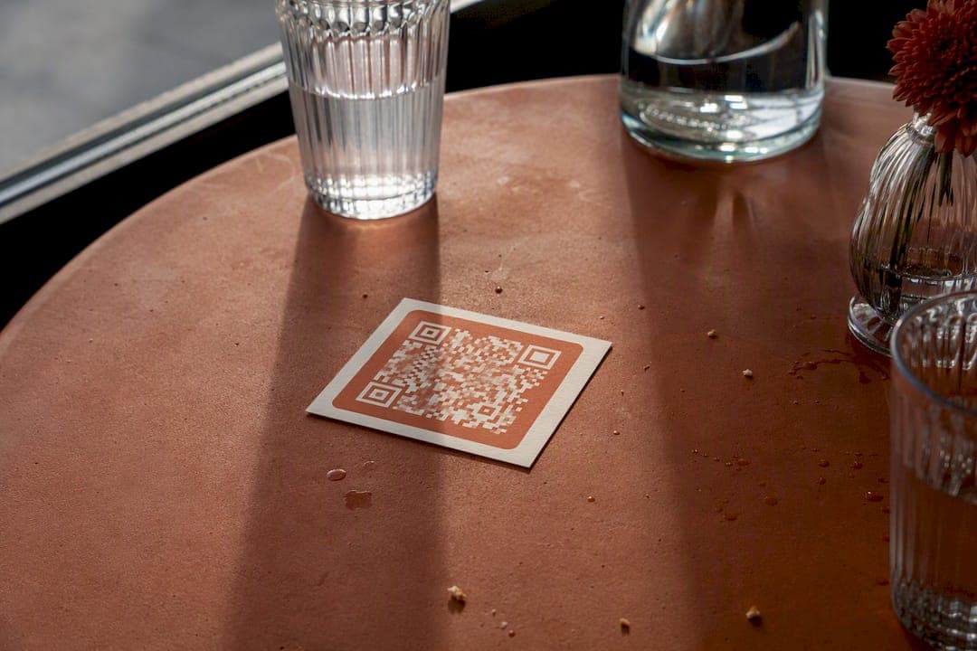 Matte printed QR code card on table surface